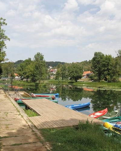 a dock with boats on it by a body of water