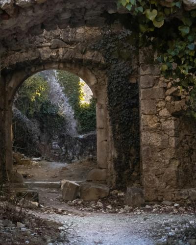 brown concrete arch during daytime