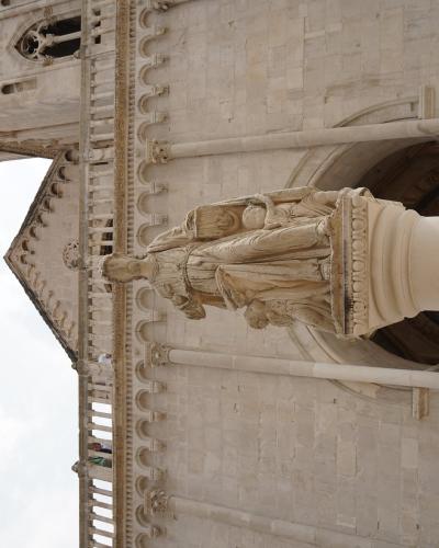 Trogir, stonework and statue
